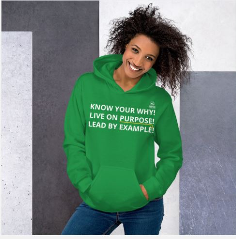 A woman in green hoodie with words on it