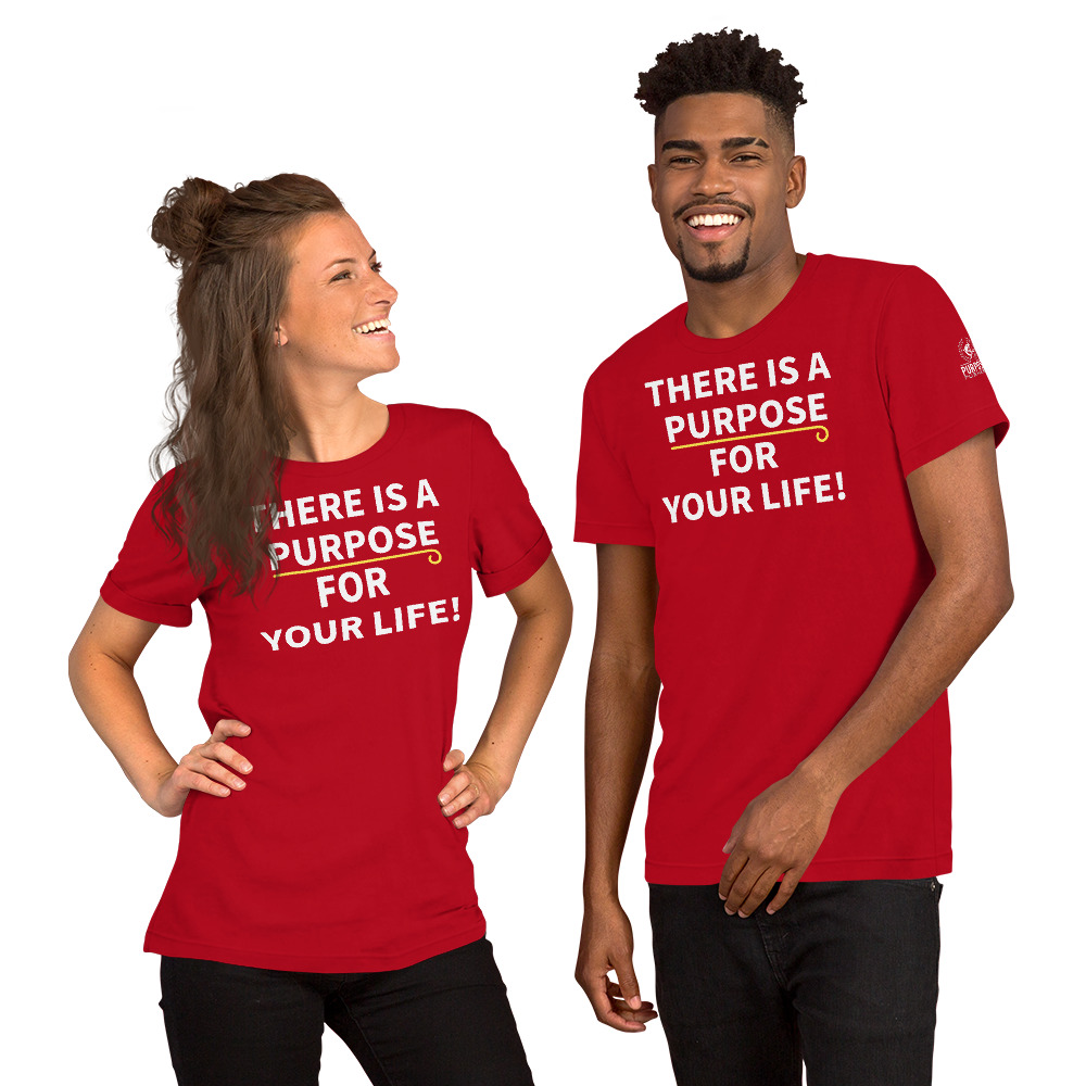 A man and woman wearing red shirts with the words " there is a purpose for your life ".